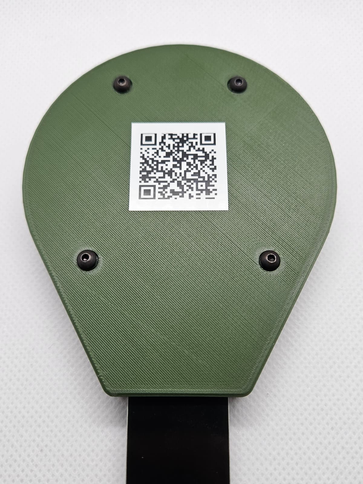 Back of Sproutlink sensor showing QR code label